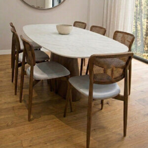 Mesa comedor de diseño Oval con tapa en textura melaminica simil piedra Mármol Carrara.